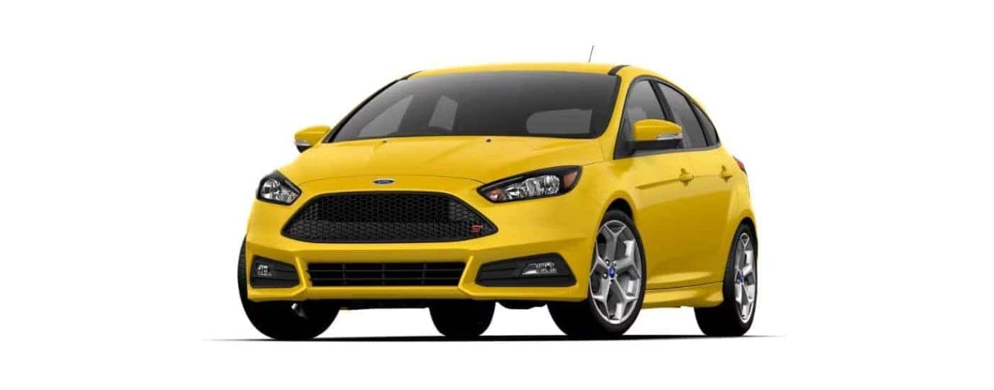 Yellow 2018 Ford Focus angled left.