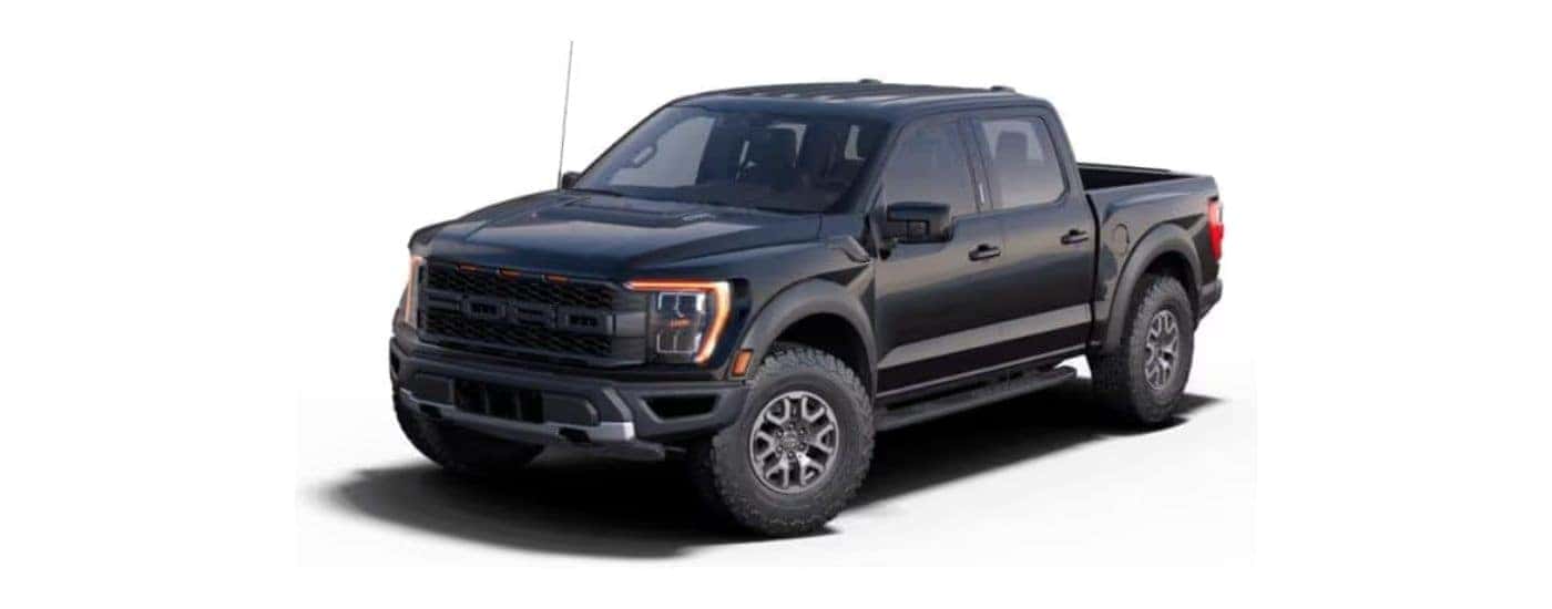 A black 2021 Ford F-150 Raptor angled left on a white background.