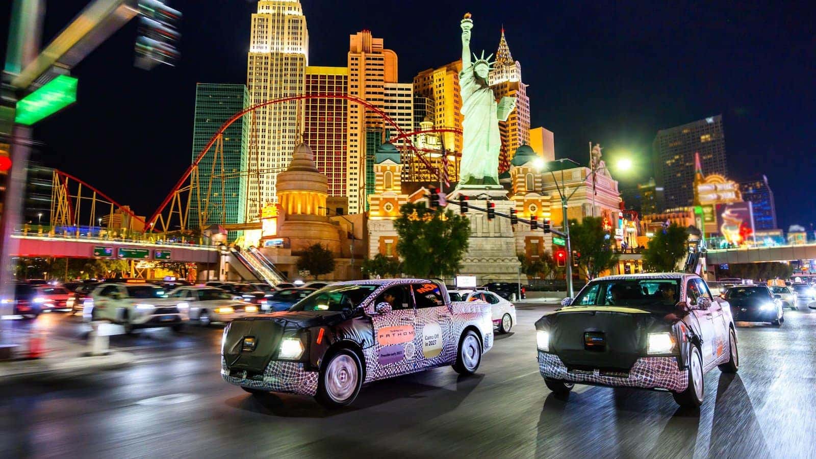 Camouflaged Ford Fathom prototypes driving at night in Las Vegas