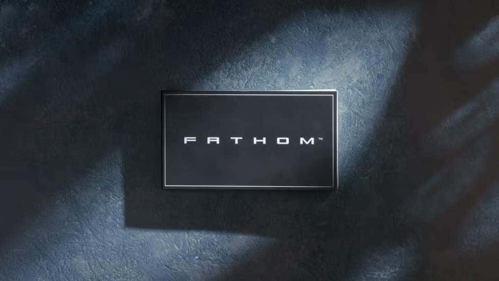 Fathom nameplate on a textured blue surface