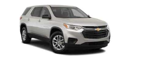 A silver 2021 Chevy Traverse is shown angled right.