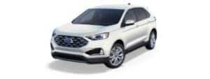 A white 2022 Ford Edge Titanium is angled left.