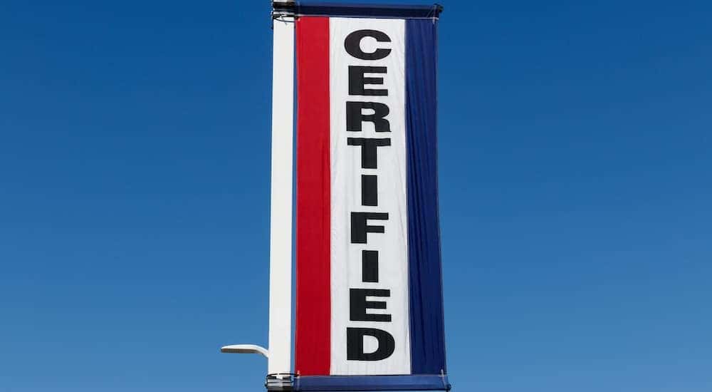 A 'certified' banner is shown at a certified pre-owned vehicle dealer.