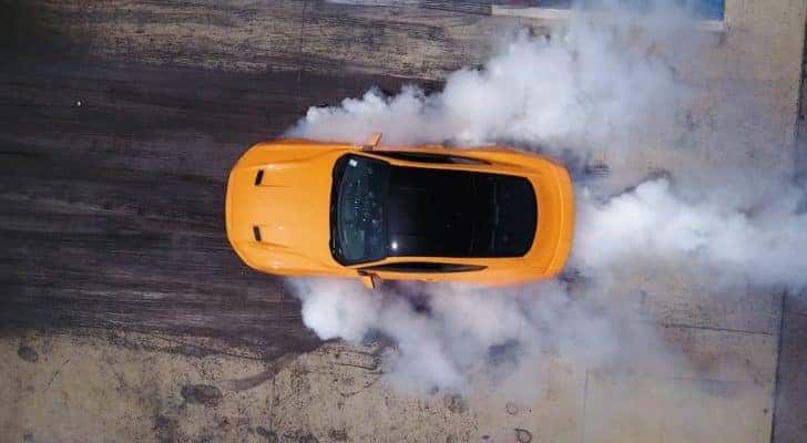 A yellow 2017 Ford Mustang Ecoboost is shown from a high angle at a used Ford dealer near you.