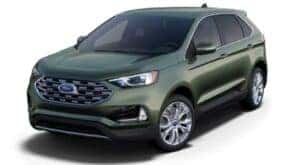 A green 2023 Ford Edge Titanium is shown angled left.