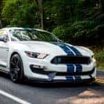 A white 2015 Ford Mustang GT350R is shown from the front at an angle after leaving a Ford dealer near Columbia, TN.