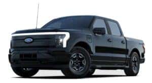 A black 2023 Ford F-150 Lightning is angled left.