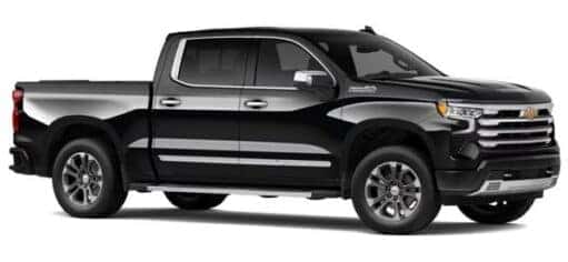 A black 2023 Chevy Silverado 1500 High Country is shown angled right.