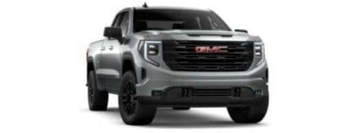 A silver 2023 GMC Sierra 1500 Elevation is angled right.