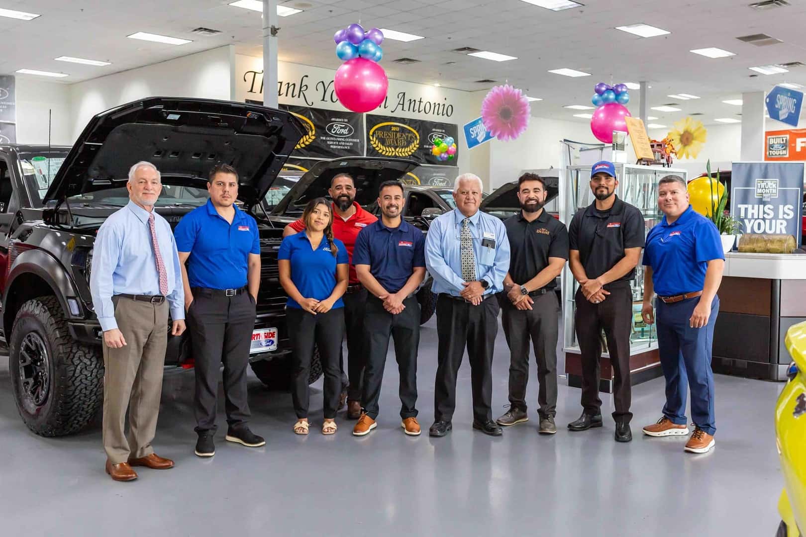 employees standing in open room