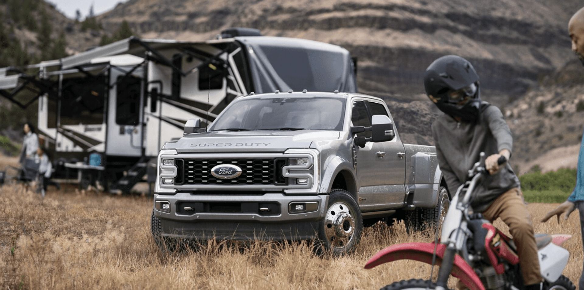 2024 Ford F-250SD parked outside in front of a camper 