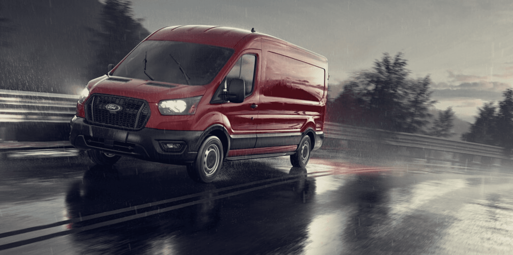 Red Ford Transit on a highway