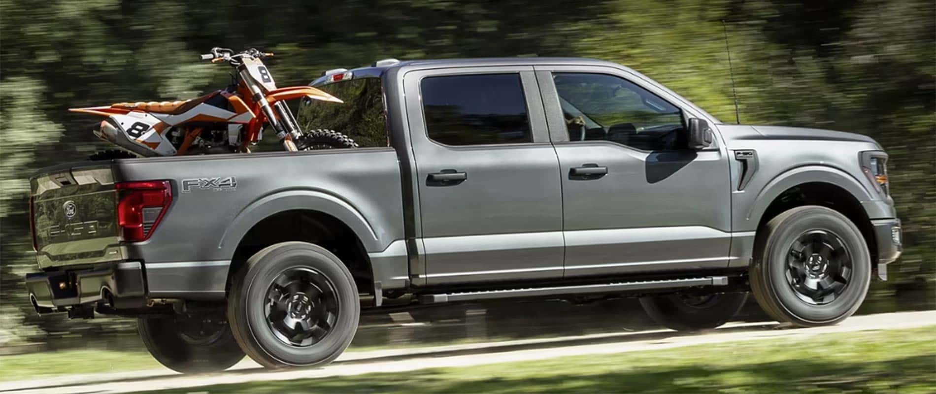 2025 Ford F-150 with a dirtbike in the bed