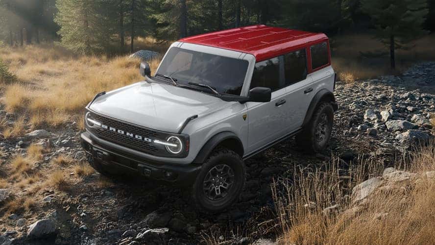 An overhead view of a silver Ford Bronco with a red roof.