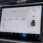 A close up of a dashboard with Ford Blue Cruise.