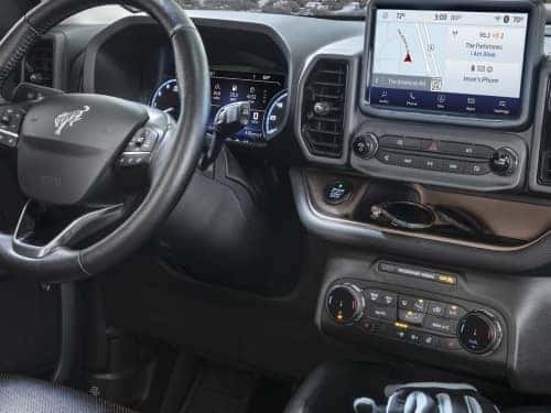 2024 Ford Bronco Sport view of dash and touchscreen showing navigation map