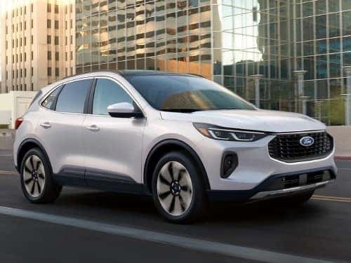 2025 Ford Escape driving outside a city