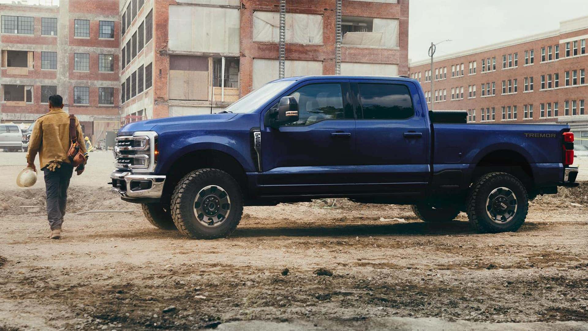 Construction Worker Walking in front of 2026 Ford Super Duty