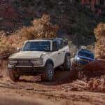 Two 2026 Ford Broncos Driving in Desert