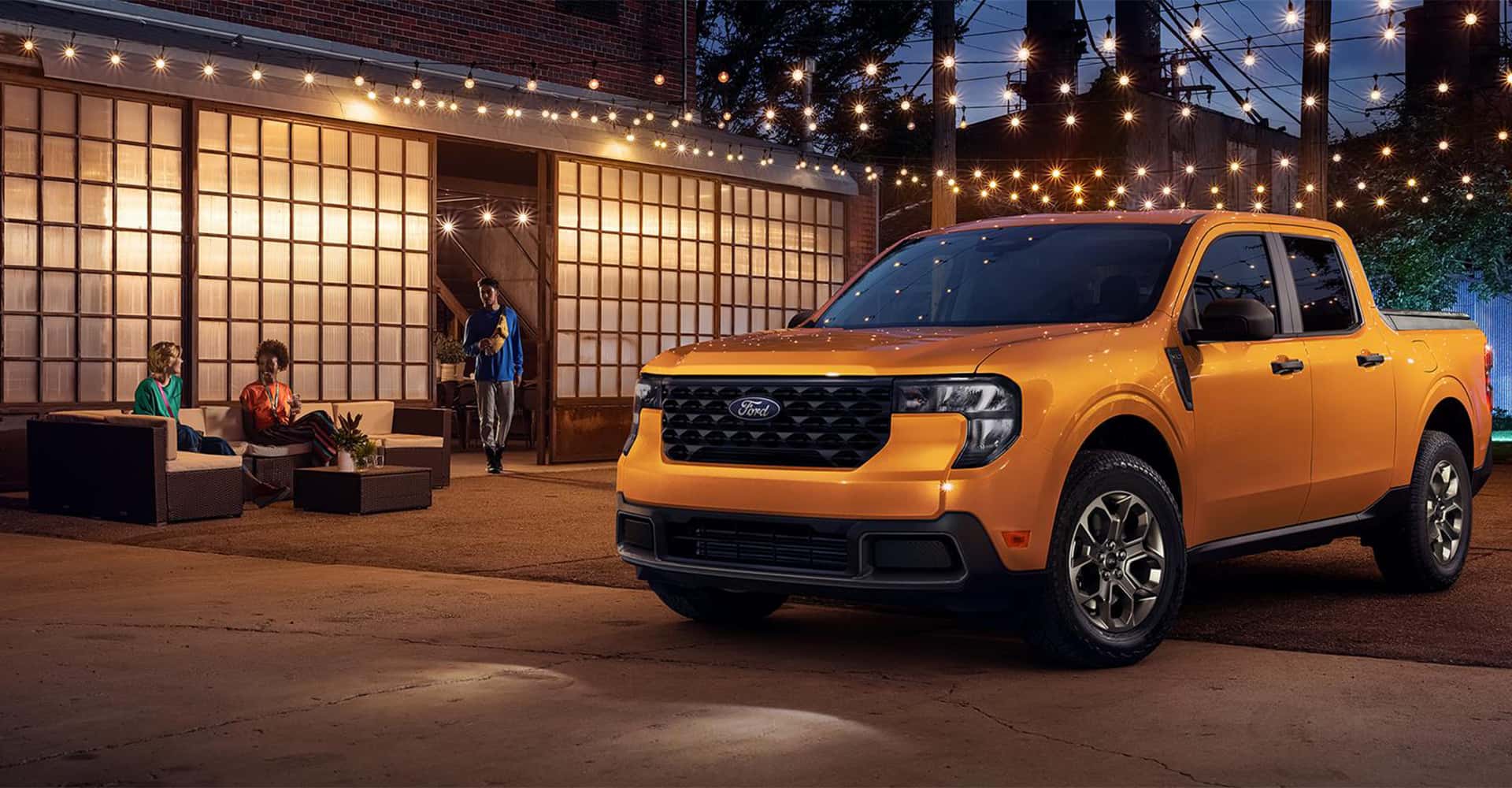 2026 Ford Maverick in orange at night