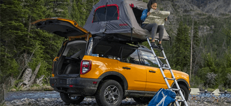 tent on roof while stationary