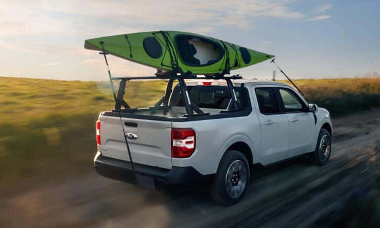 2024 Ford Maverick Exterior Driving Away With Kayaks On The Roof