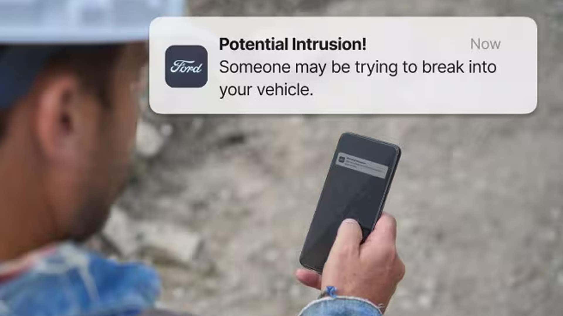 Phone showing F-150 connectivity and security notifications