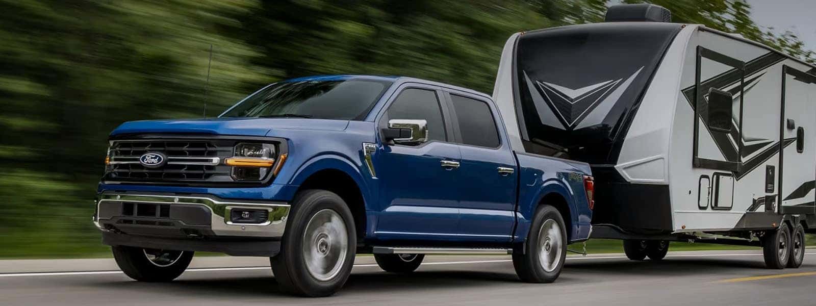 2025 Ford F-150 parked in forest at sunrise