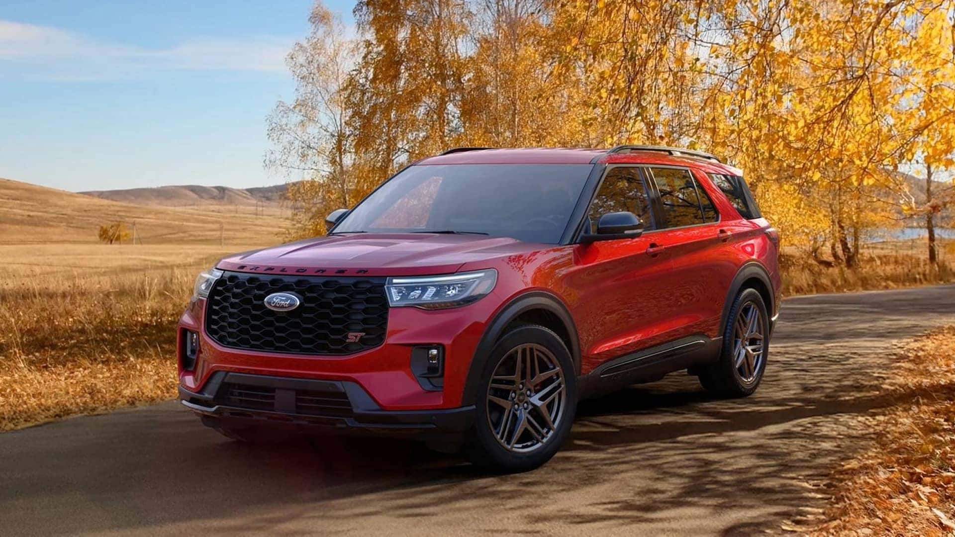 ford explorer parked outside by trees