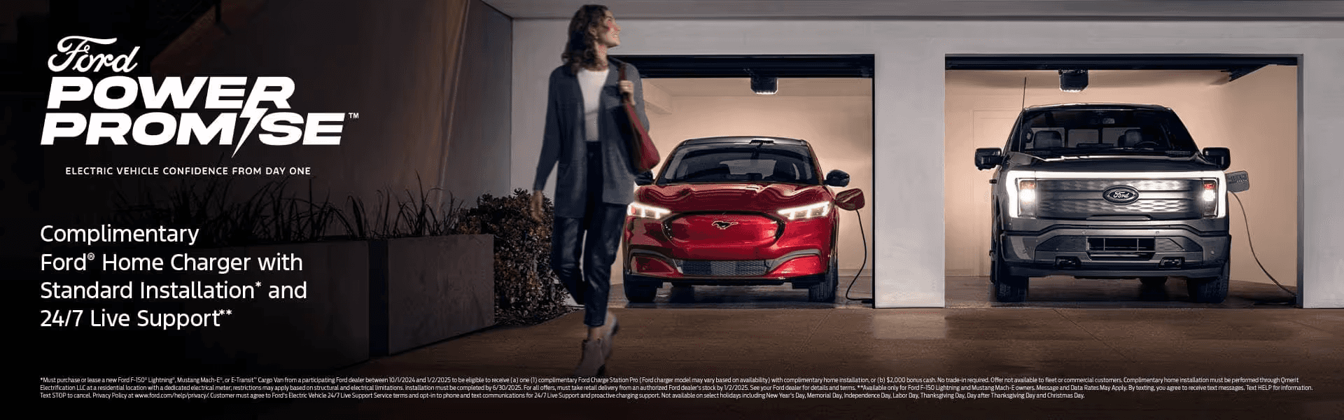 Lady in front of 2 Ford EVs in Garage