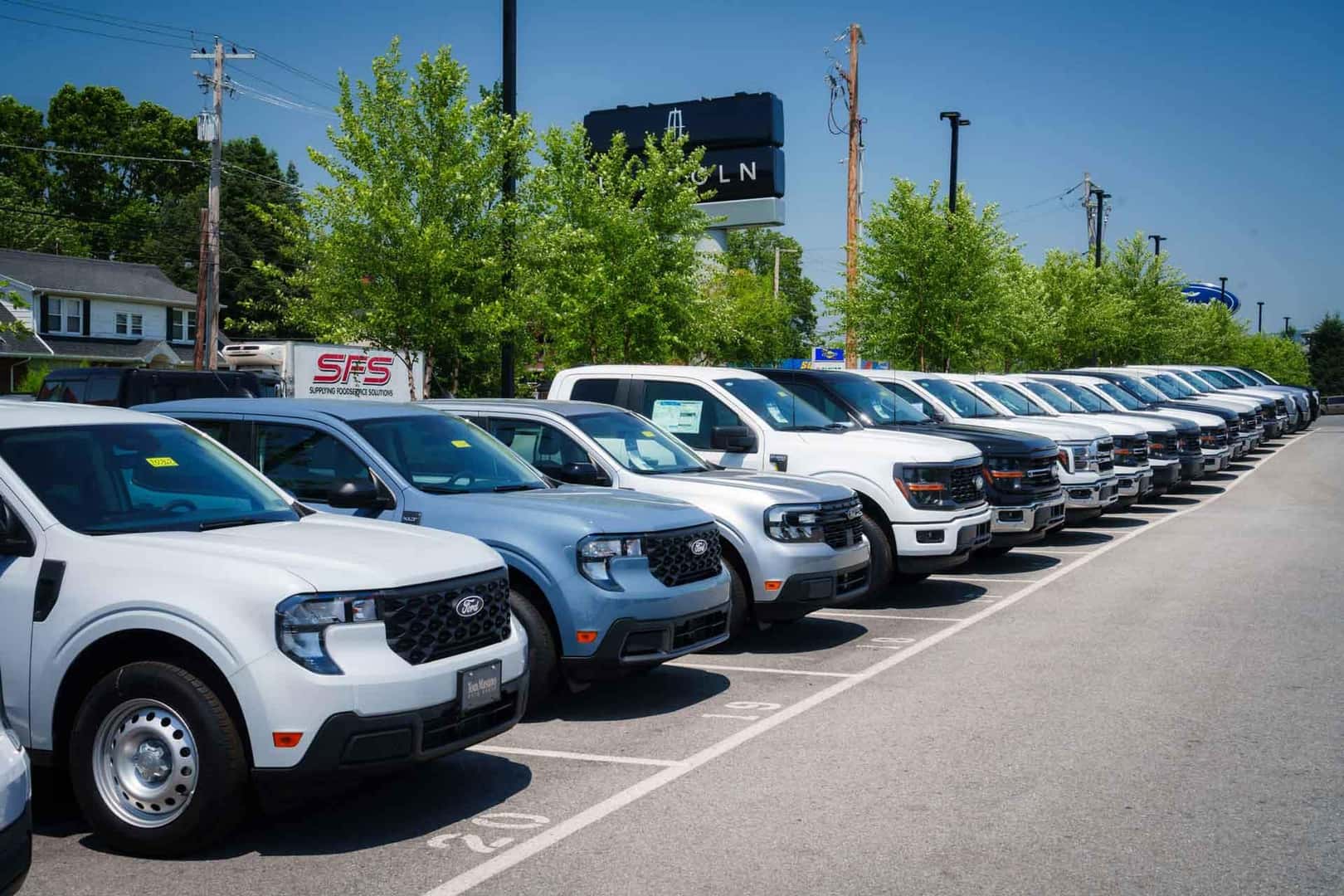 Row of cars for sale.