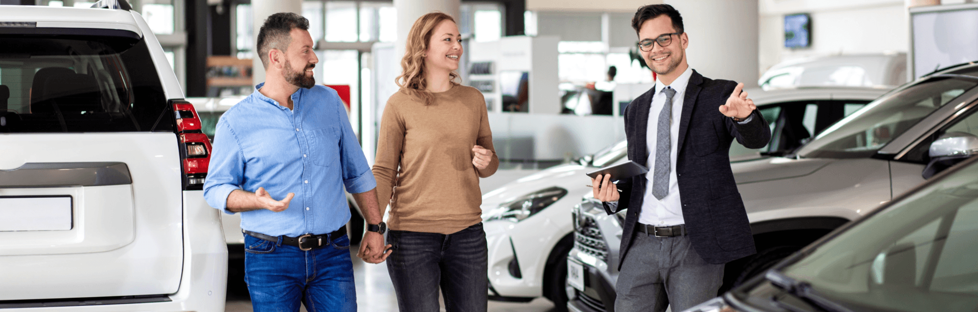 Clean and modern dealership facility with covered service drive