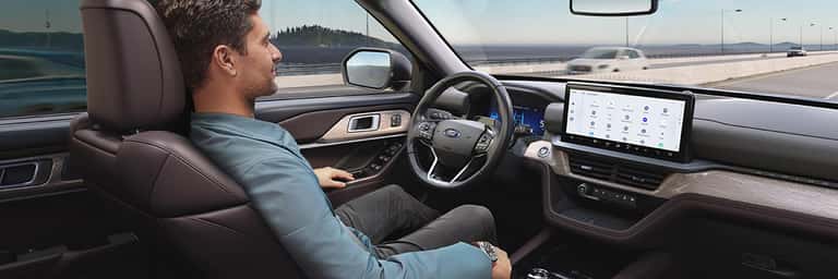 2025 interior of ford explorer with man driving