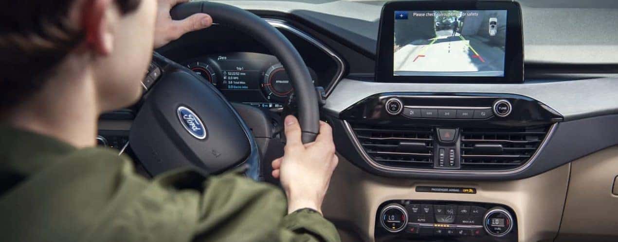 A close up shows the back up view on the infortainment screen in a 2021 Ford Escape.