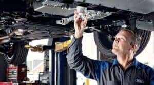 Ford Maintenance Service Man Working On Car