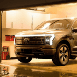 The 2023 Ford F-150 Lightning charging, one in the lineup of Ford hybrids